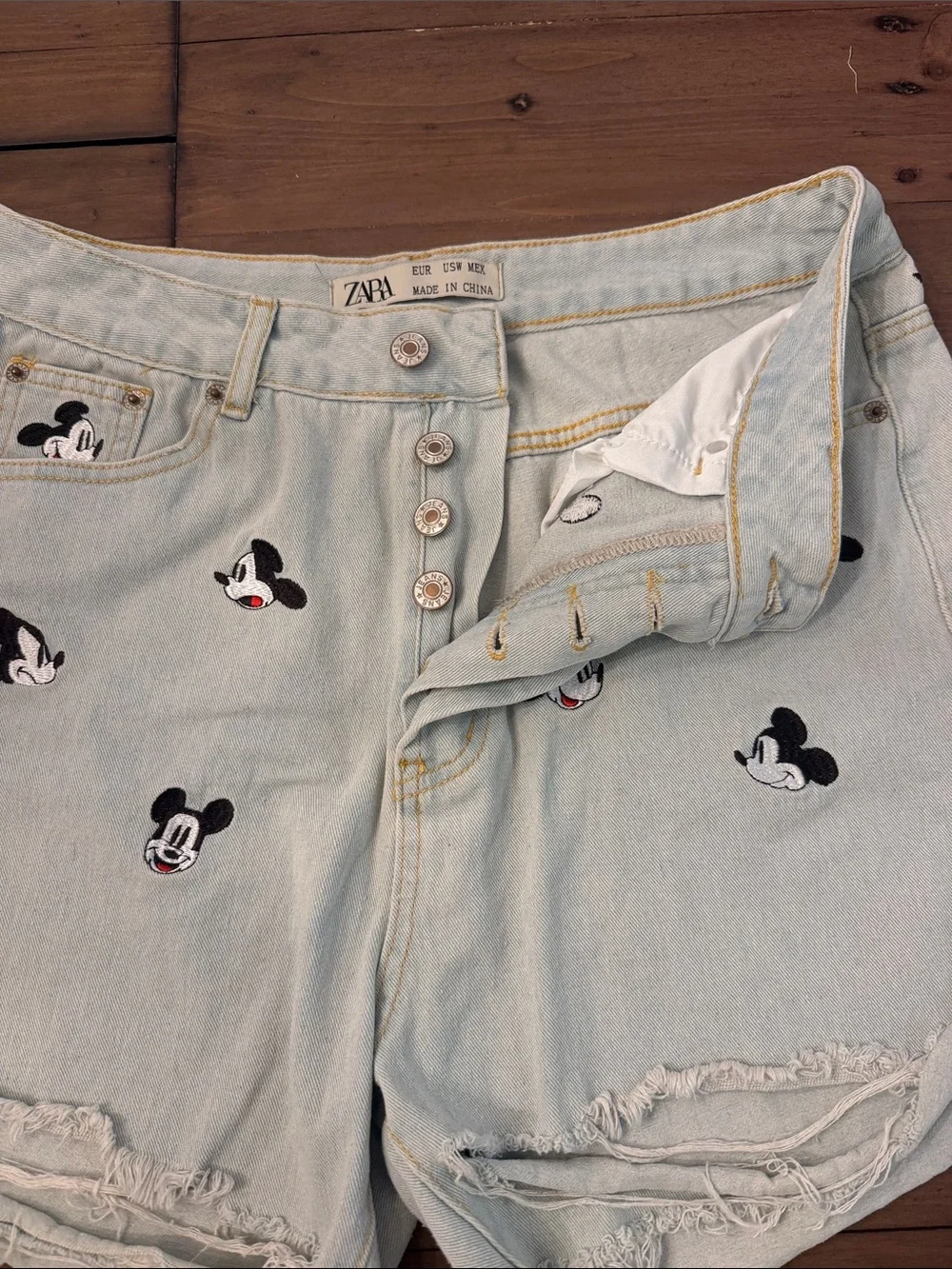 Zara distressed Mickey Mouse denim shorts
